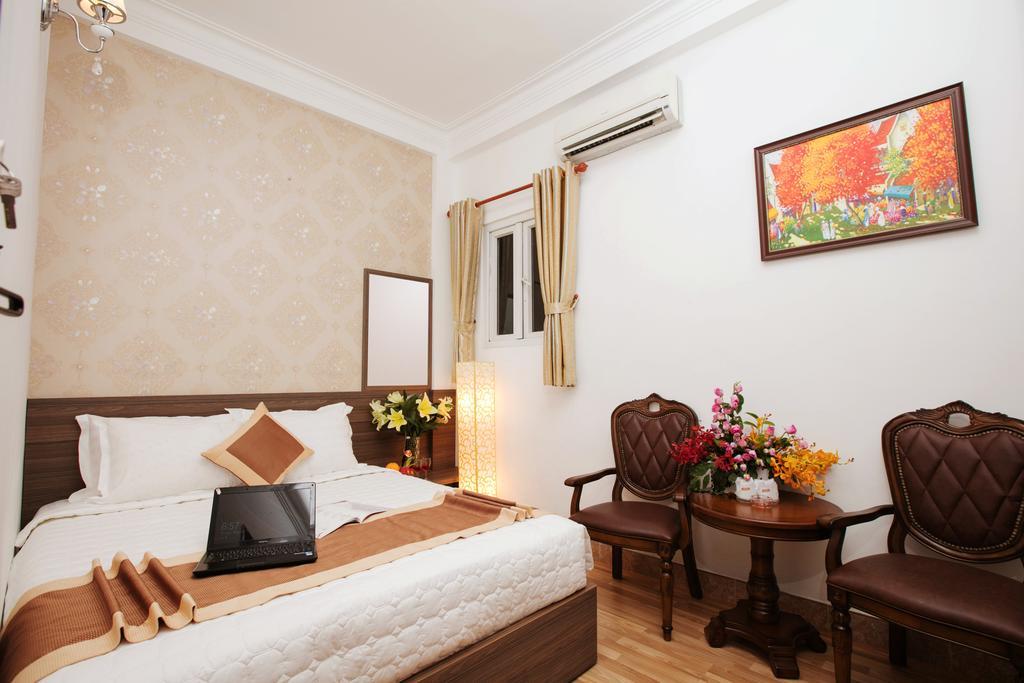 Rosa Centre Hotel Cidade de Ho Chi Minh Quarto foto
